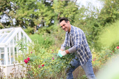 Professional team handling green waste removal in Farringdon