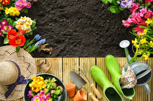 Professional gardener carrying out scheduled maintenance