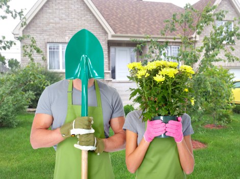 Professional gardeners shaping hedges and borders in Farringdon